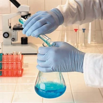 Ansell 92-670 Touch&#039;N&#039;Tuff kék púdermentes nitril kesztyű (100db-os doboz)